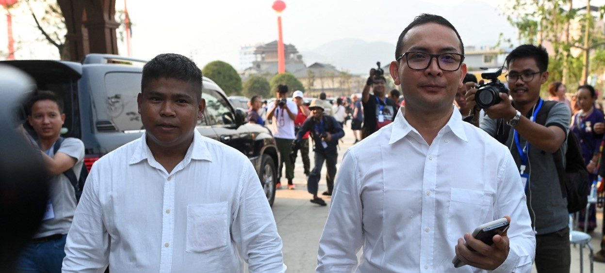 Tun Myat Naing (R), commander-in-chief of the Arakan Army (AA), and Nyo Tun Aung (L), AA's second-in-command, arrive for a welcome dinner, organised to commemorate the 30th anniversary of peace-building efforts in Wa State, in Panghsang on April 16, 2019. (Photo: Ye Aung THU / AFP)