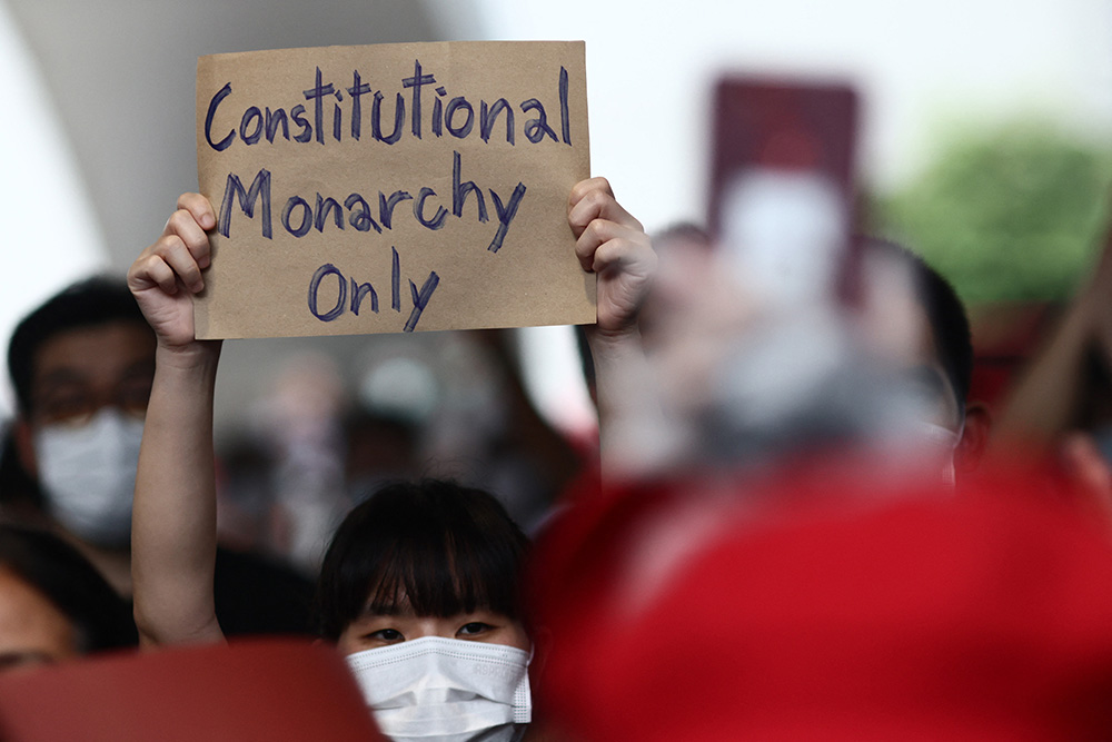 A protester holds a sign during a demonstration