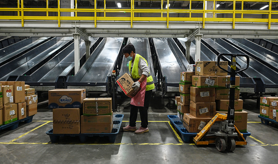 An employee works in the warehouse of Cainiao Smart Logistics Network