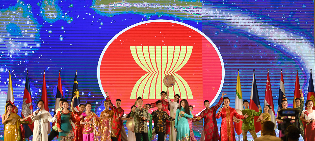 Artists perform on stage at the end of the opening ceremony of the ASEAN Summit
