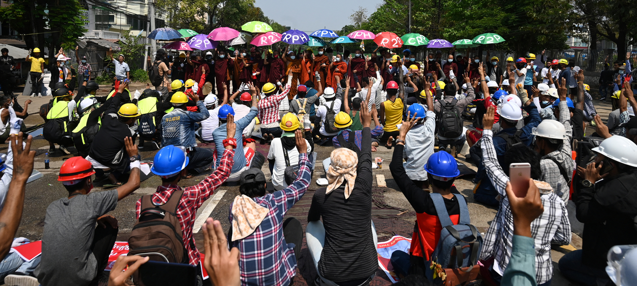 Protesters take part in a demonstration against the military coup in Yangon on March 11, 2021.